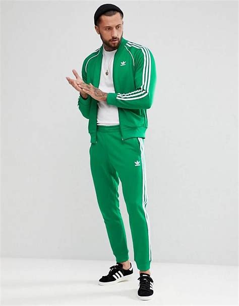 green Adidas jogging suit